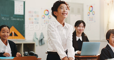 Buy stock photo Smile, student and japanese child in classroom with learning, praise and good exam mark at school. Technology, kids and language academy with happy group, growth and development success in class