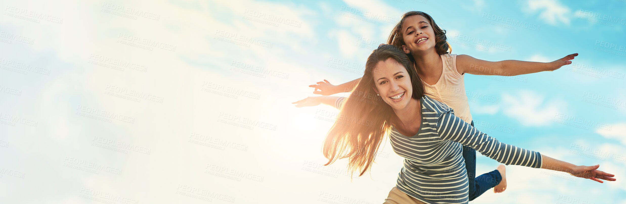 Buy stock photo Portrait, piggy back and mother with girl, outdoor and bonding together with happiness. Banner, family and parent with mama carrying daughter, freedom and space with love, flying and summer holiday