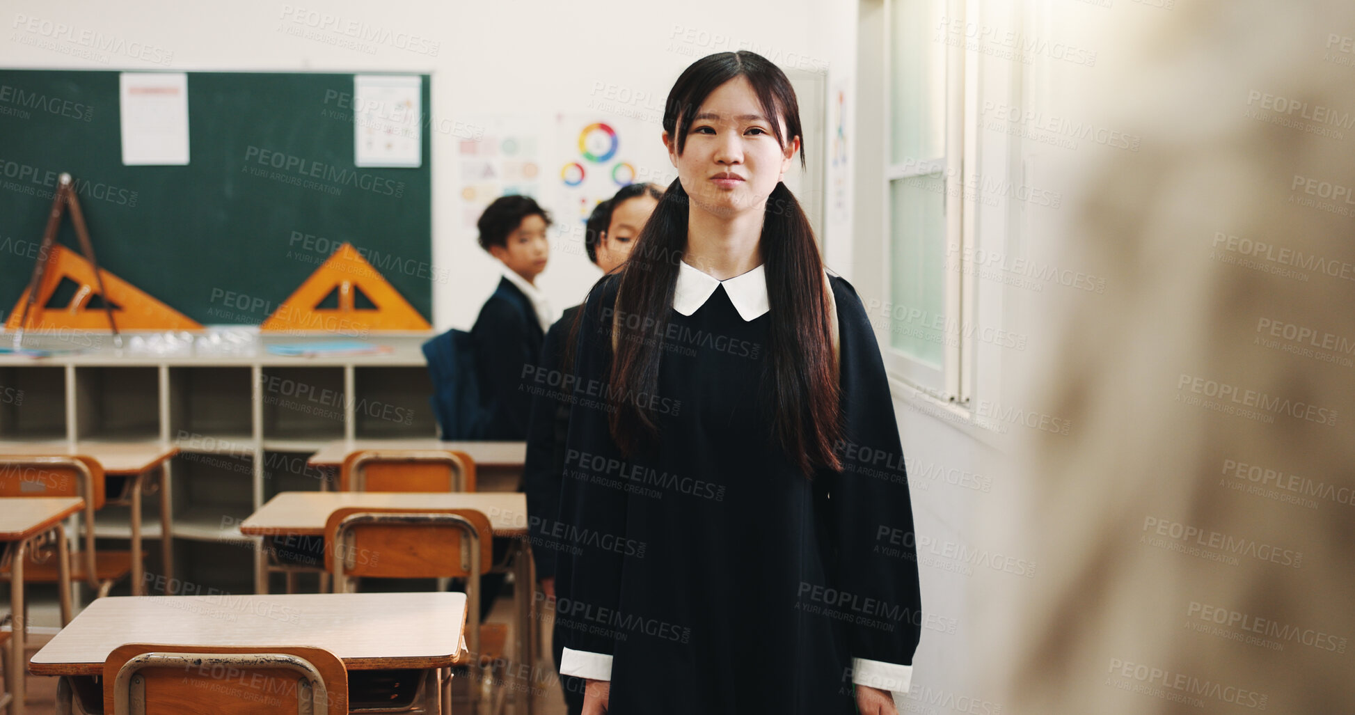 Buy stock photo Education, student and child in classroom, anxious and nervous for presentation assignment and learning. High school, shy and girl with stage fright, knowledge or teenager with social phobia in Japan