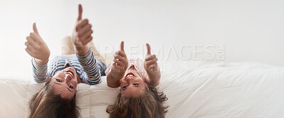 Buy stock photo Portrait, smile or thumbs up with woman and daughter upside down on bed in home for motivation or success. Like emoji, mockup space or yes with happy single parent woman and girl child in bedroom