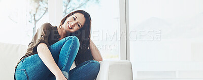 Buy stock photo Portrait, woman and relax with smile on sofa for comfort, weekend break and resting in living room. Happy, person or chill on couch in lounge for day off, peaceful and confidence with banner in house