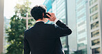 Businessman, back and city with phone call for discussion, proposal or conversation in an urban town. Japan, man or employee talking or listening on mobile smartphone for business opportunity or deal