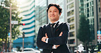 Japanese businessman, city street and portrait for confidence as attorney for law firm or company. Male person, outdoor and pride as legal professional for morning commute or career with arms crossed