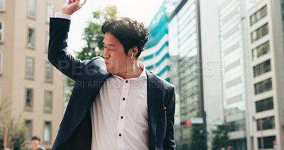 Buy stock photo Business, man and dance with earphones in city for listening to music, energy and podcast entertainment. Male person, freedom and streaming audio for morning commute, celebration and rhythm in Japan 