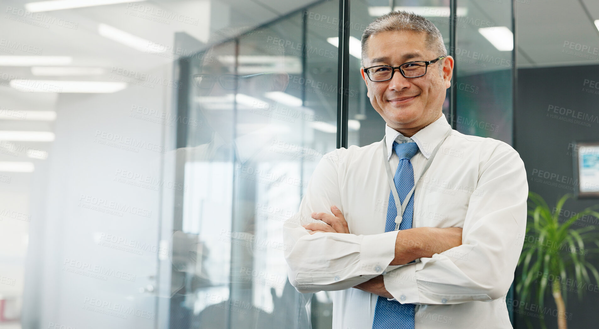 Buy stock photo Mature, portrait and businessman with arms crossed in hospital for healthcare services and about us. Proud, happy medical inspection or confident medical safety director at wellness clinic in Japan