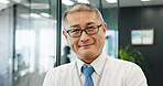 Portrait, confidence or businessman with smile in hospital for healthcare services, quality or about us. Proud, happy Asian inspector or confident medical safety director at wellness clinic in Japan