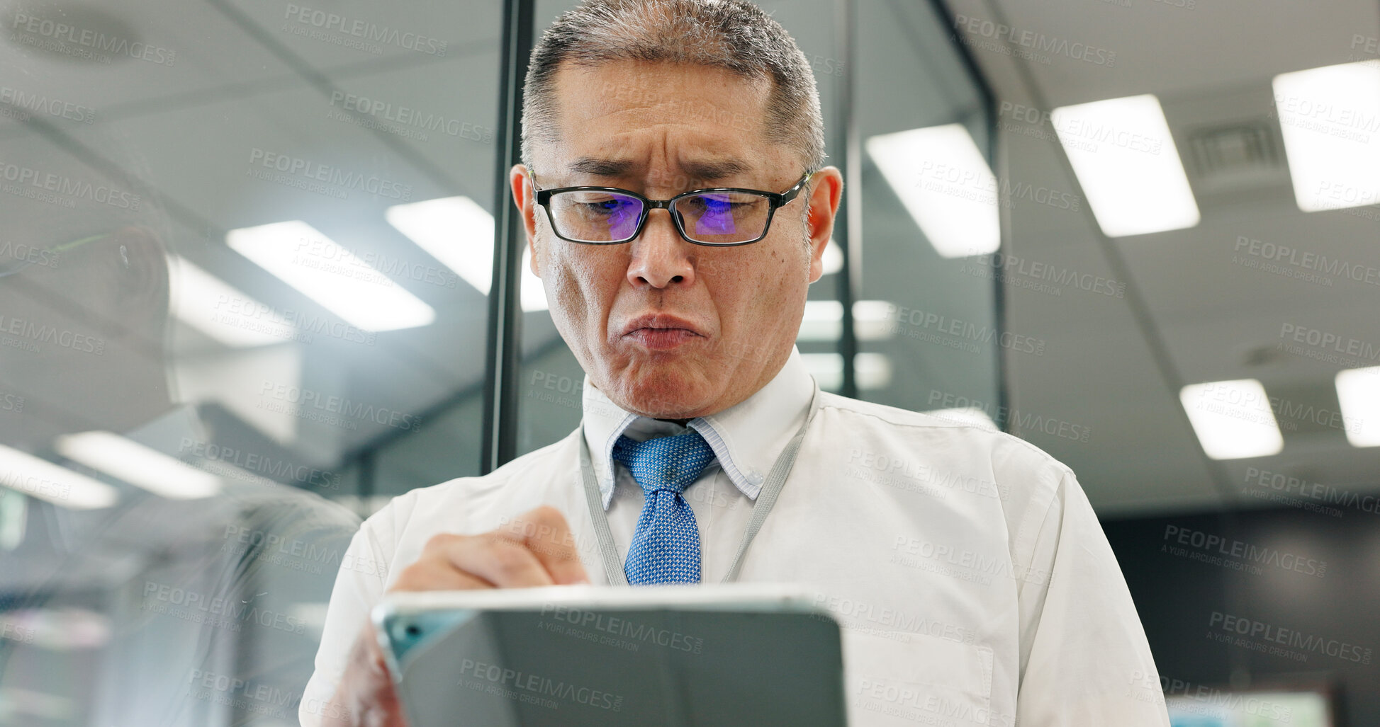 Buy stock photo Tablet, mature and business man research online, reading email or check insurance policy on app. Japanese person, digital technology or manager planning project, risk management or feedback in office