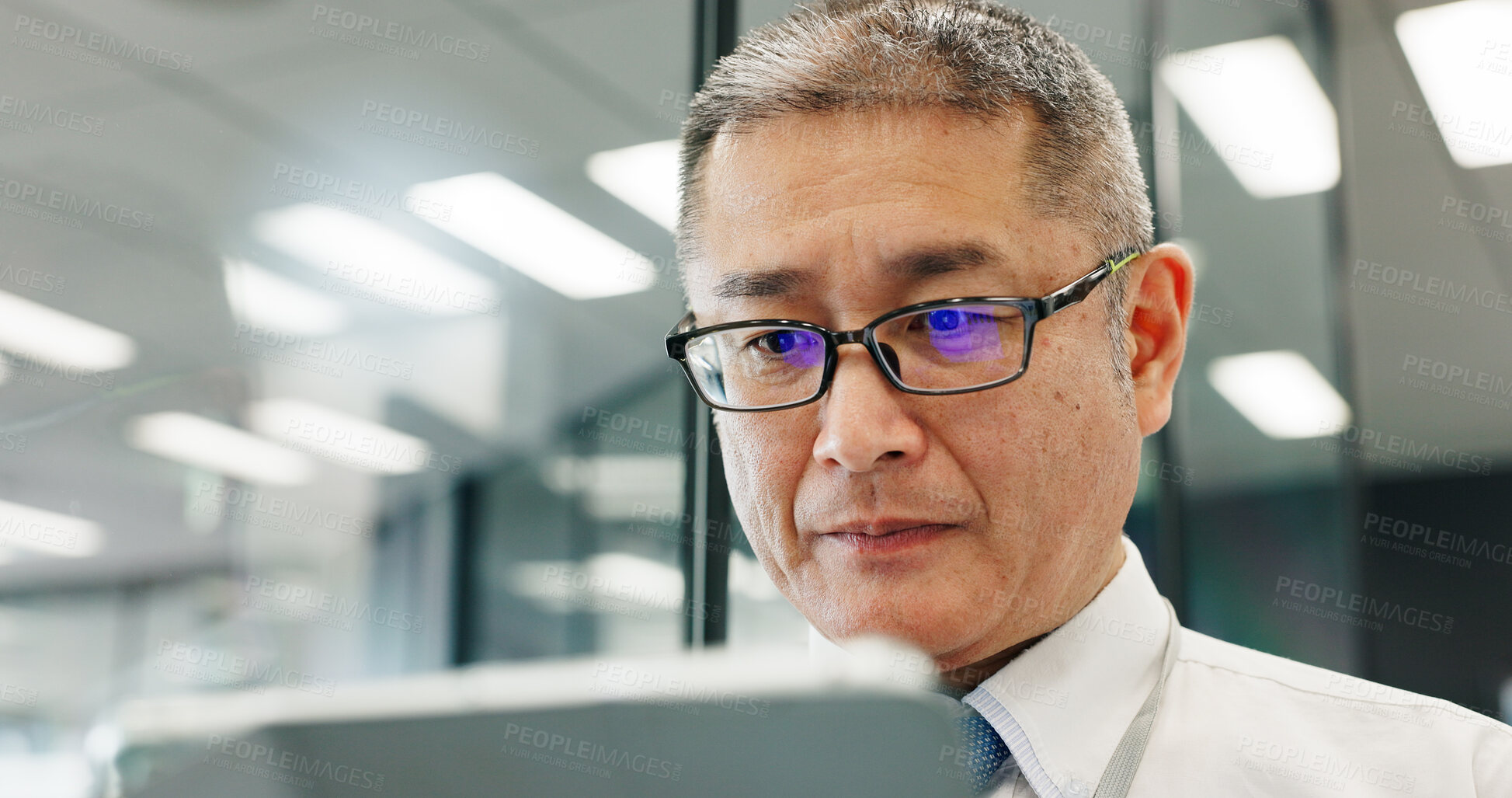 Buy stock photo Tablet, reading and Japanese business man research, email and review insurance policy. Mature person, digital technology and manager with financial coverage, risk management or protection in office