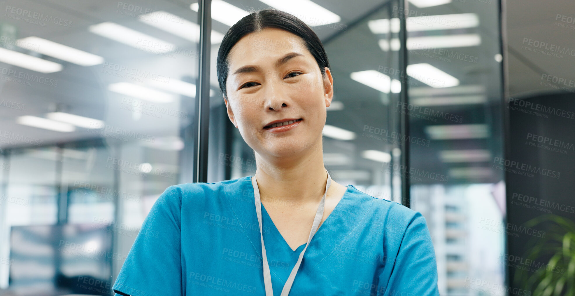 Buy stock photo Portrait, woman and nurse with pride in hospital for healthcare services, about us and medical advice. Person, surgeon and confident with career ambition, diagnosis trust and treatment help in Japan