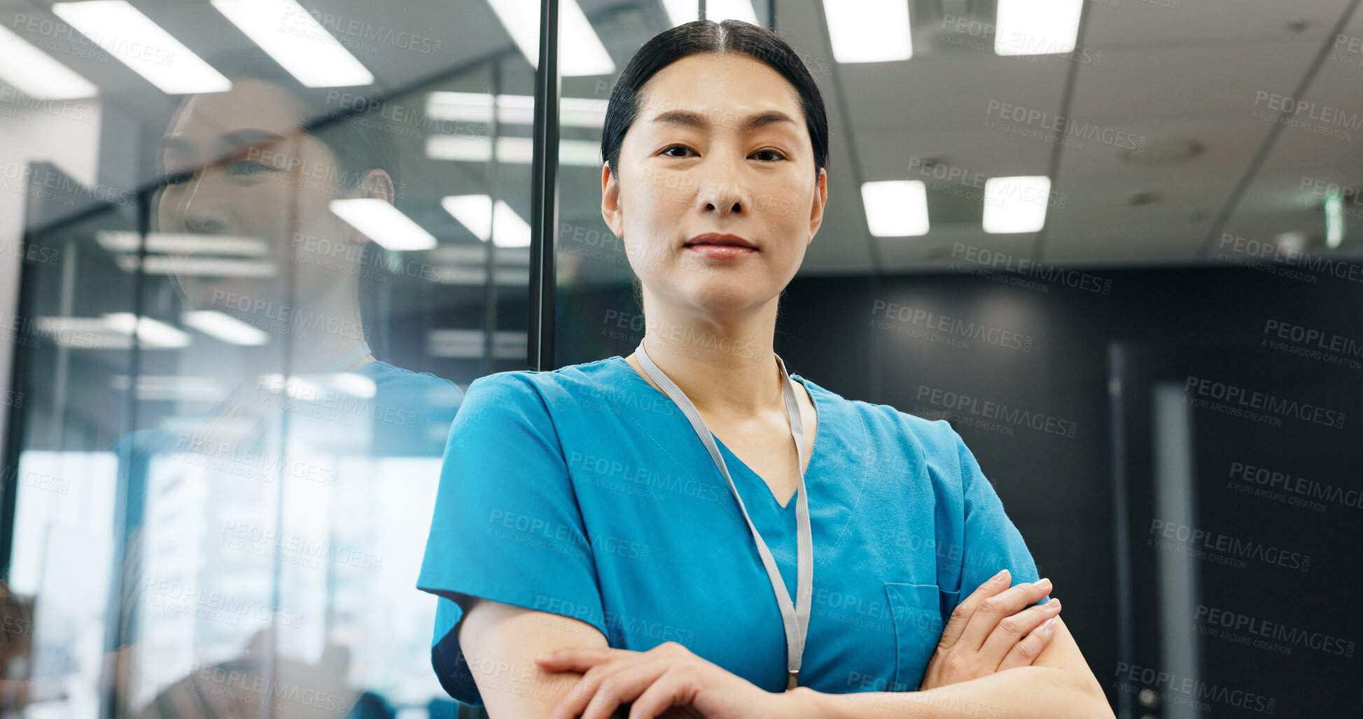 Buy stock photo Portrait, woman and nurse with confidence in hospital for healthcare services, about us and medical advice. Female surgeon, arms crossed and career ambition, diagnosis and treatment trust in Japan