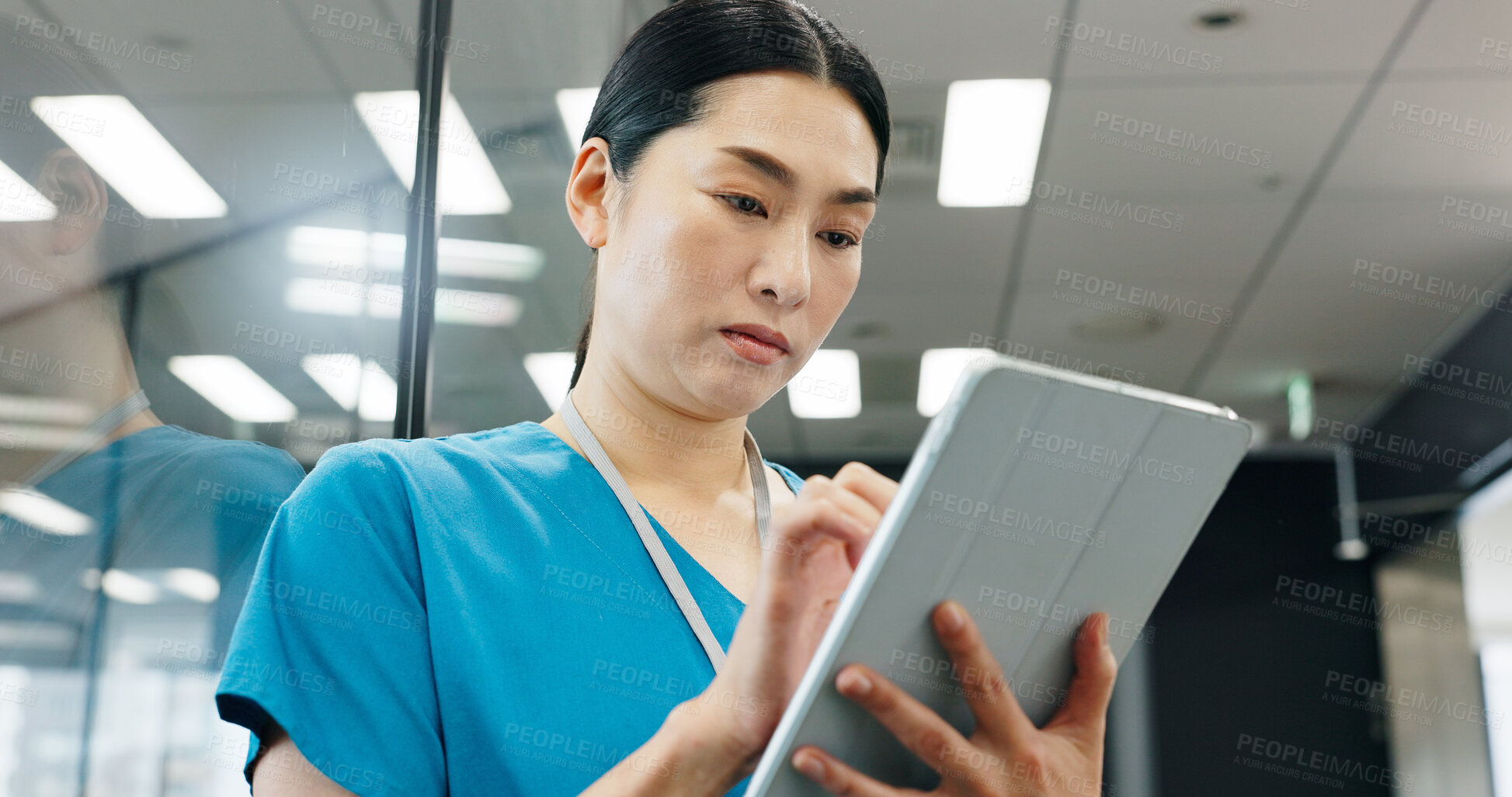 Buy stock photo Nurse, tablet and healthcare tech of Japanese woman with thinking, web document and checklist in hospital. Surgeon, nursing and online research for health, wellness and clinic care with professional