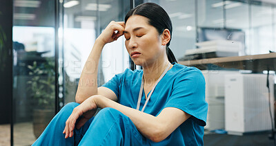 Buy stock photo Japanese, woman and nurse with depression in hospital for healthcare stress, medical mistake and burnout. Surgeon, headache and anxiety with surgery crisis, bad news and treatment disaster in Japan