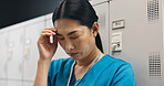 Japanese, woman and surgeon with headache in hospital of healthcare stress, medical mistake and burnout risk. Nurse, depression and anxiety of surgery crisis, bad news and treatment disaster in Japan