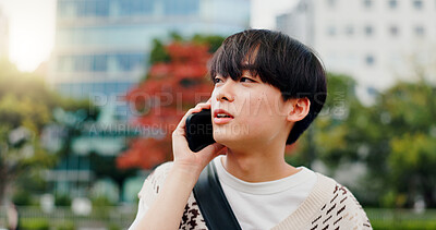 Buy stock photo Japan, phone call and outdoor with man, conversation and network for communication. Happy, person and student with smartphone, mobile user and technology with digital app, commute and contact