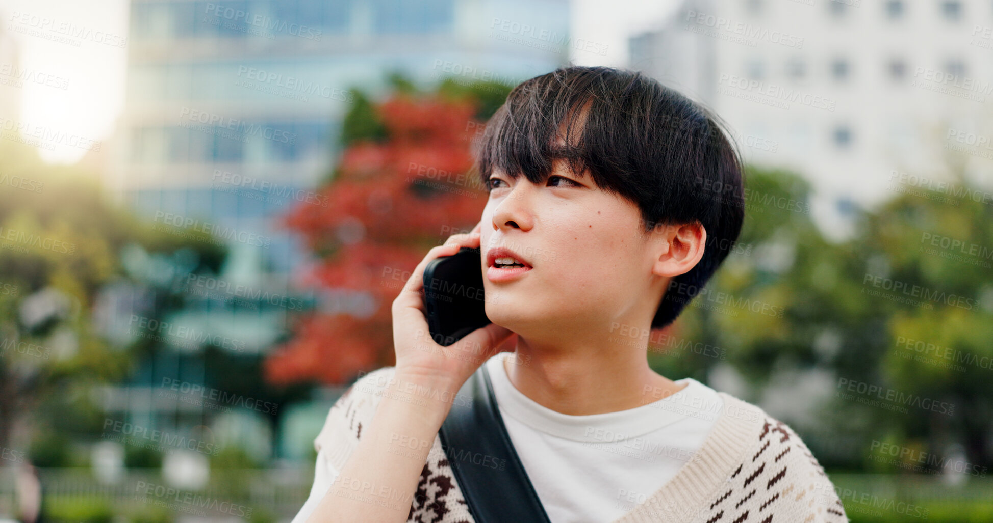 Buy stock photo Japan, phone call and outdoor with man, conversation and network for communication. Happy, person and student with smartphone, mobile user and technology with digital app, commute and contact