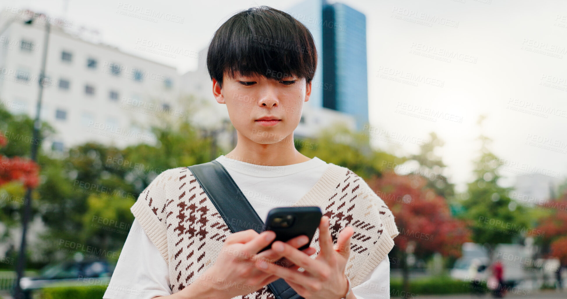 Buy stock photo Phone, travel and Japanese man in city with navigation for university with mobile app. Outdoor, cellphone and male student with directions for college campus with international exchange program.