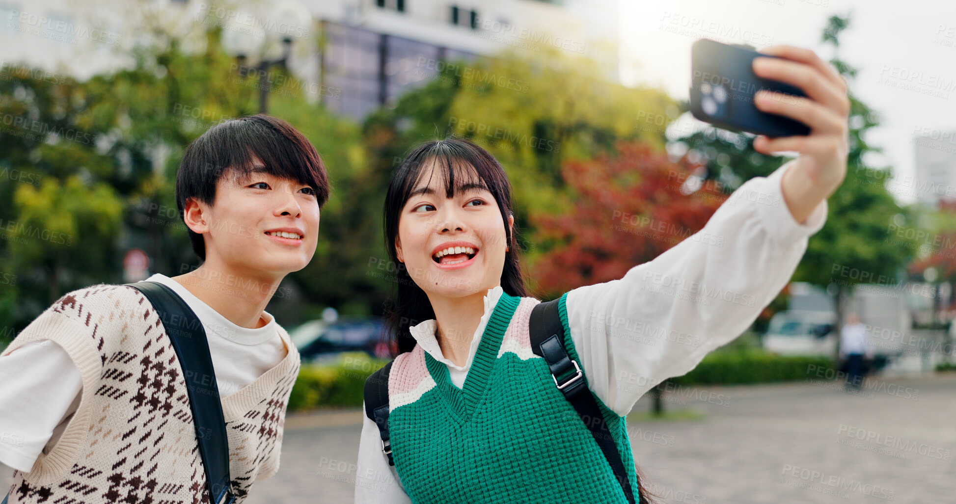 Buy stock photo Couple, selfie and happy in city for social media, healthy relationship and memories with love in Osaka. Japanese people, influencers or smile in park for photography, content creation or live stream