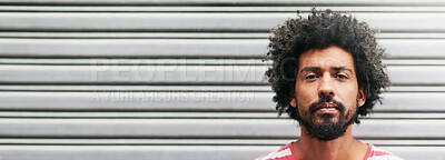 Buy stock photo City, wall and portrait of African man with serious face, commute and travel in urban town. Holiday, hipster and afro hair with space, banner and outdoor with confidence, cool and trip in Uganda