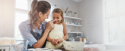 Buy stock photo Baking, woman and laughing with child, home and mixing of ingredients, bonding and happy family in kitchen. House, funny and baker with daughter, learning and recipe for dessert, love and kid