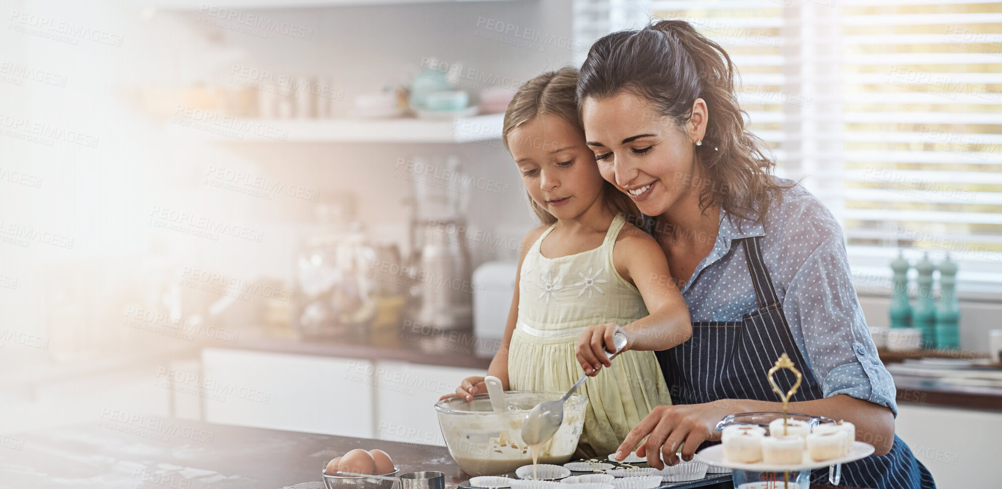 Buy stock photo Baking, home and mother with girl in kitchen, help and learning with child development. Food, apartment and happy mama with daughter, ingredients and recipe with growth, smile and bonding together