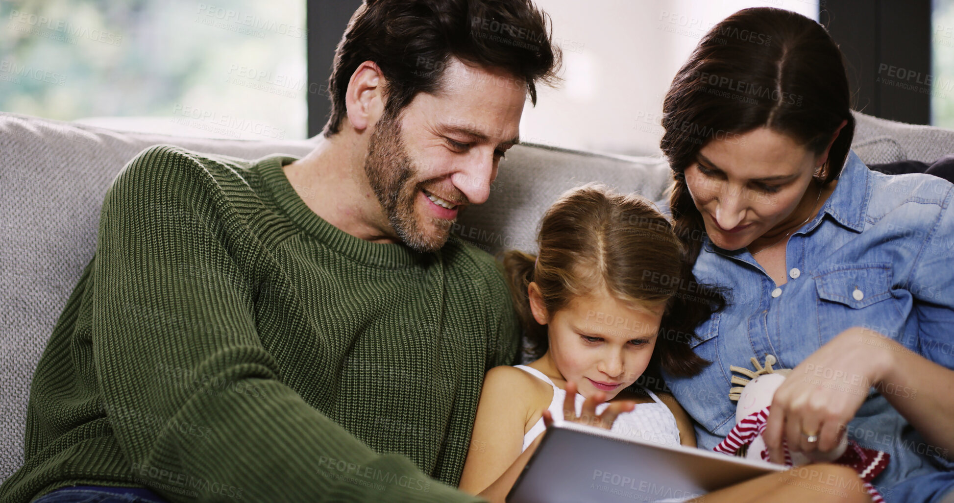 Buy stock photo Family, parents and child on tablet in home for relax, streaming movie and watch cartoon. Mother, happy father and kid on technology for reading ebook, learning and play game together for bonding