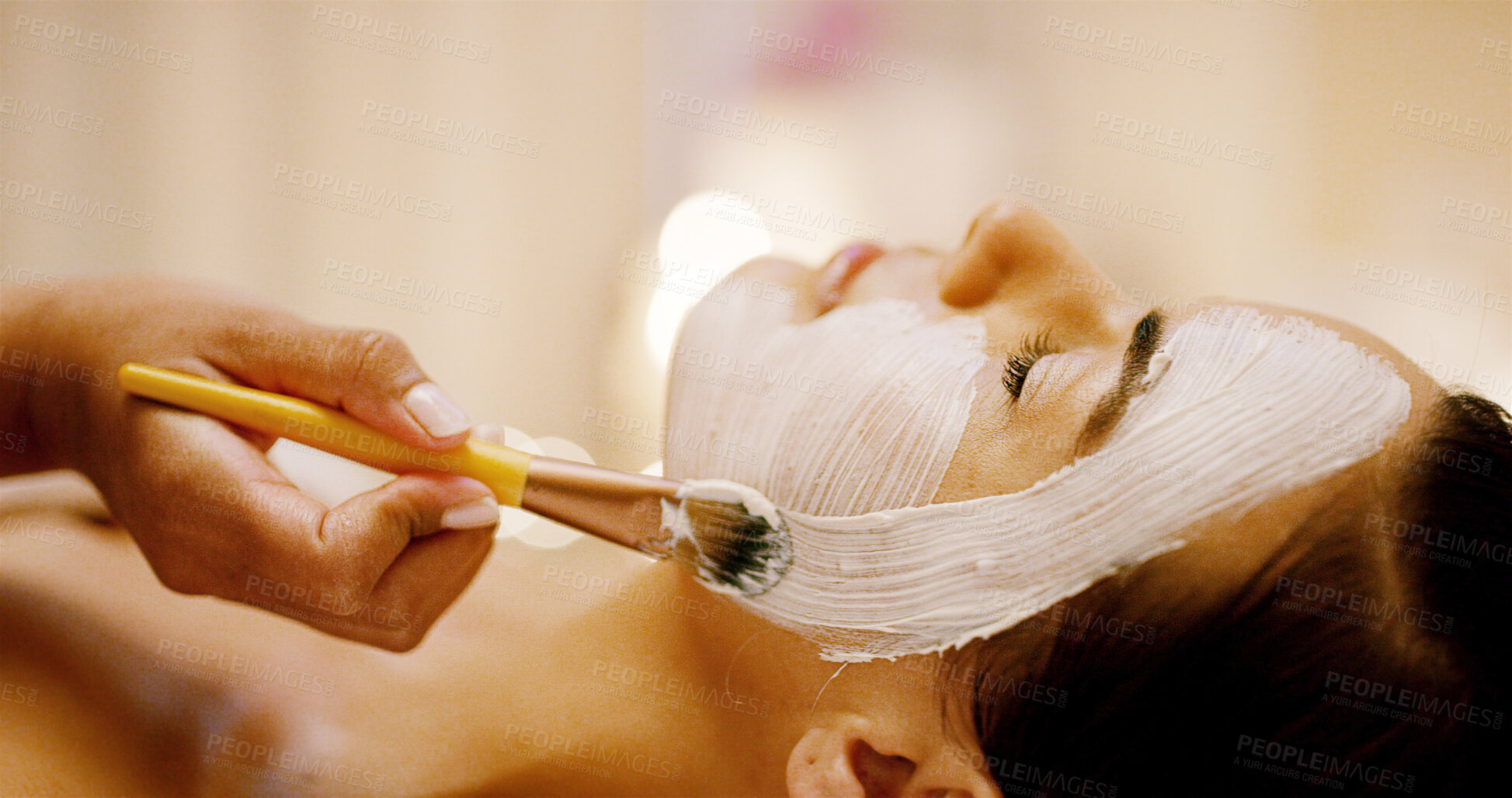 Buy stock photo Hands, woman and brush with face mask at spa of peeling detox, facial treatment and deep cleaning. People, relax and brush with cosmetic cream for healing, natural glow and organic skincare at resort