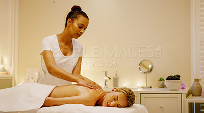 Buy stock photo Woman, therapist and back massage in spa for relax, sleeping and deep tissue treatment at luxury hotel. Peace, client and masseuse in resort for tension relief, stress management and hospitality