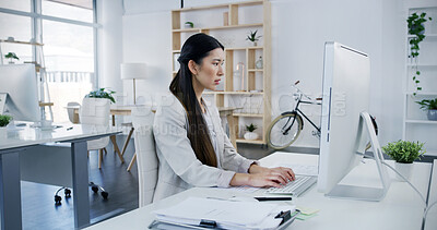 Buy stock photo Typing, office and business Asian woman on computer for online project, website and planning. Professional, corporate and person on pc with documents for research, proposal review or administration