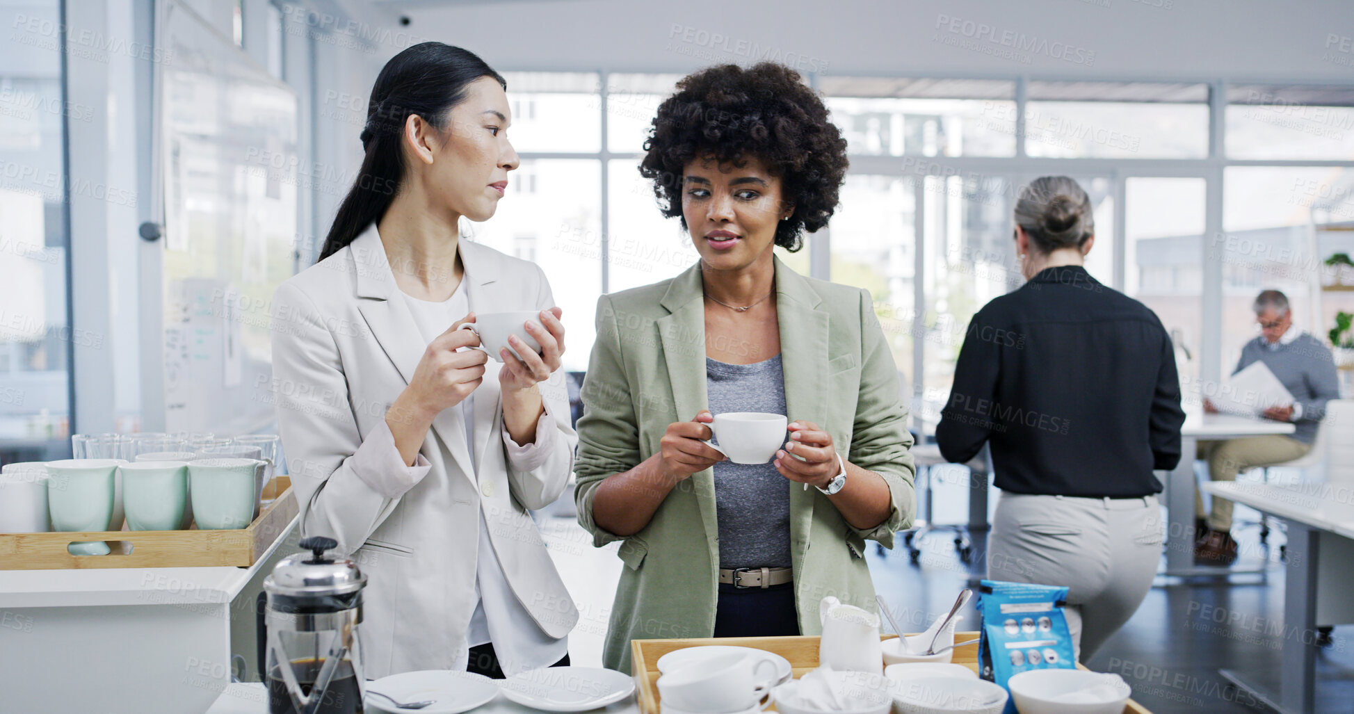 Buy stock photo Businesswomen, coffee break and together with talk, gossip and conversation as employees for company. Female people, office and drinking tea for lunch, hot beverage or professional in accounting firm