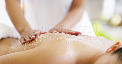 Buy stock photo Person, hands and masseuse with salt scrub on back for exfoliation, massage or treatment at spa. Closeup, masseur or client with natural cosmetics for relaxation, detox or physical therapy at salon