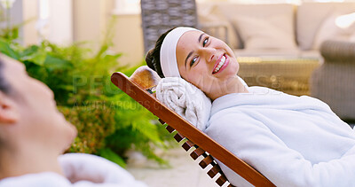 Buy stock photo Women, friends and happy at spa with relaxing for massage, bonding and self care for luxury. People, chair and smile or satisfied with conversation at resort or hotel for vacation, break and peace