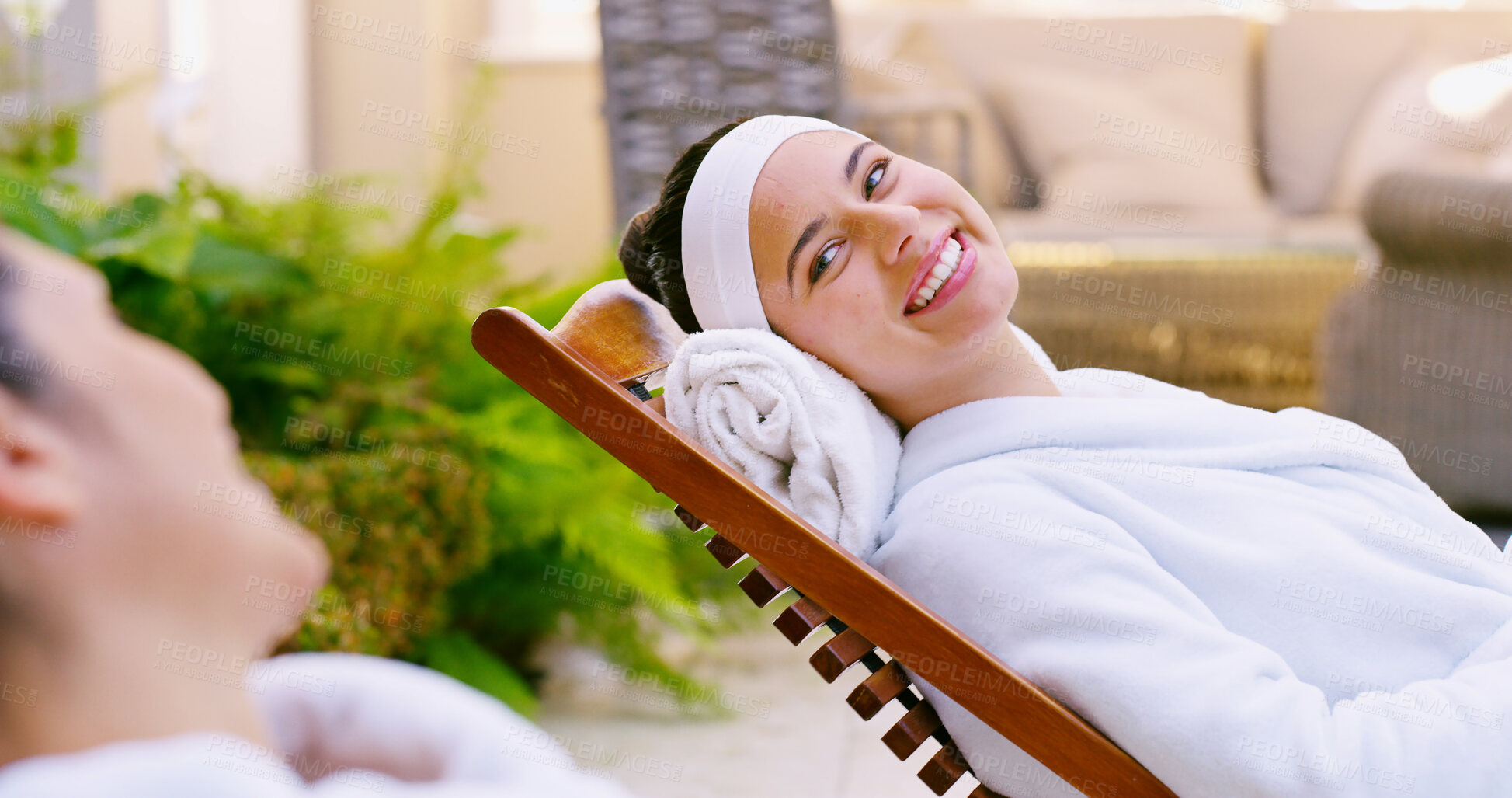 Buy stock photo Women, friends and happy at spa with relaxing for massage, bonding and self care for luxury. People, chair and smile or satisfied with conversation at resort or hotel for vacation, break and peace