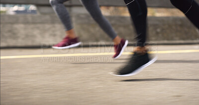 Buy stock photo Fitness, feet and people running in city for exercise, training or fast race on road. Athletes, legs and speed on street for marathon preparation, workout and endurance challenge in competitive group
