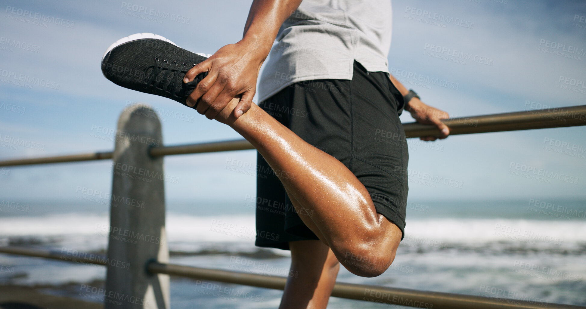 Buy stock photo Man, runner and warm up legs at beach, stretching and outdoor nature for fitness. Male person, sea promenade and footwear for exercise preparation, getting ready and cardio workout by ocean waves