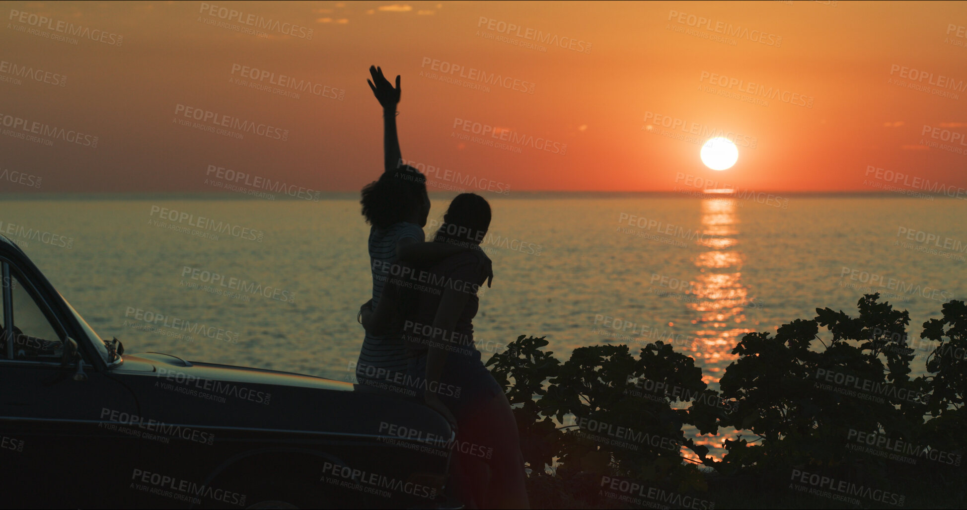 Buy stock photo Sunset, couple and freedom by beach on road trip with hugging, travel adventure or summer memory. Silhouette, lesbian people or view of ocean by car on weekend vacation and bonding together in nature