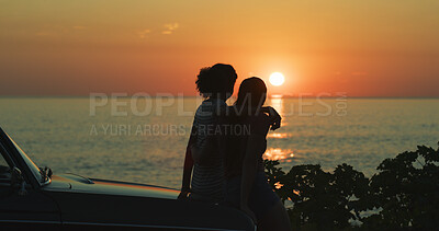 Buy stock photo Lesbian, couple and sunset at beach with silhouette for romance, hugging and adventure with car. Space, people and view of ocean on road trip, weekend vacation and bonding together with sightseeing