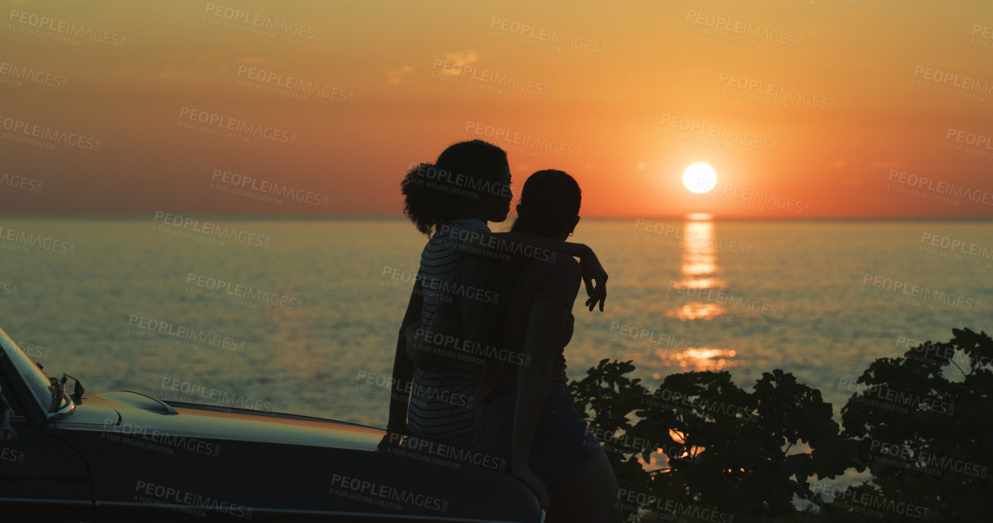 Buy stock photo Silhouette, lesbian couple and sunset at beach with hugging, romance or travel adventure with car. Space, people and view of ocean on road trip, weekend vacation and bonding together by car in nature