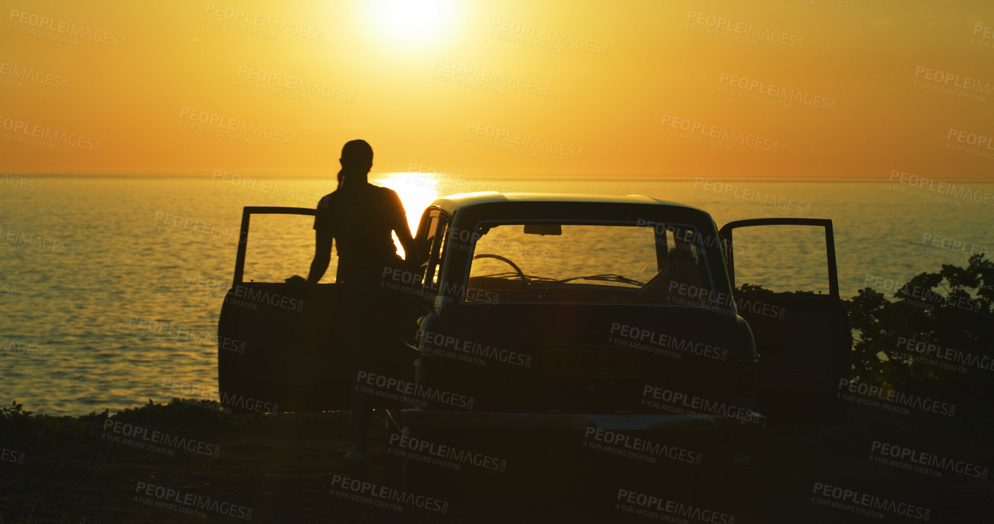 Buy stock photo Person, car and travel with beach sunset for holiday, vacation or stop at destination in nature. Back, tourist or sightseeing with natural scenery or sunshine for journey or adventure by ocean coast