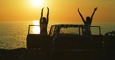 Buy stock photo Couple, silhouette and sunset at beach for road trip, freedom and excited for journey in nature. People, friends and shadow at car for travel, adventure and outdoor for memories at California ocean