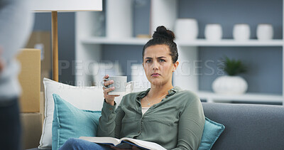 Buy stock photo Thinking, news and woman in home, watching tv and serious for politics, elections and listening to program. Morning, coffee and person in living room, media and thoughtful for change in government