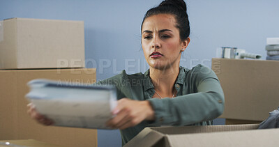 Buy stock photo Unboxing, house and woman with boxes, book and real estate with cardboard in lounge. Person, apartment and girl in living room, moving and new home with property, serious and novel with ownership