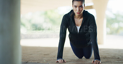 Buy stock photo Woman, portrait and fitness with push ups in city for workout, exercise or muscle gain. Active, serious or female person lifting bodyweight for strength, health and wellness on floor in an urban town