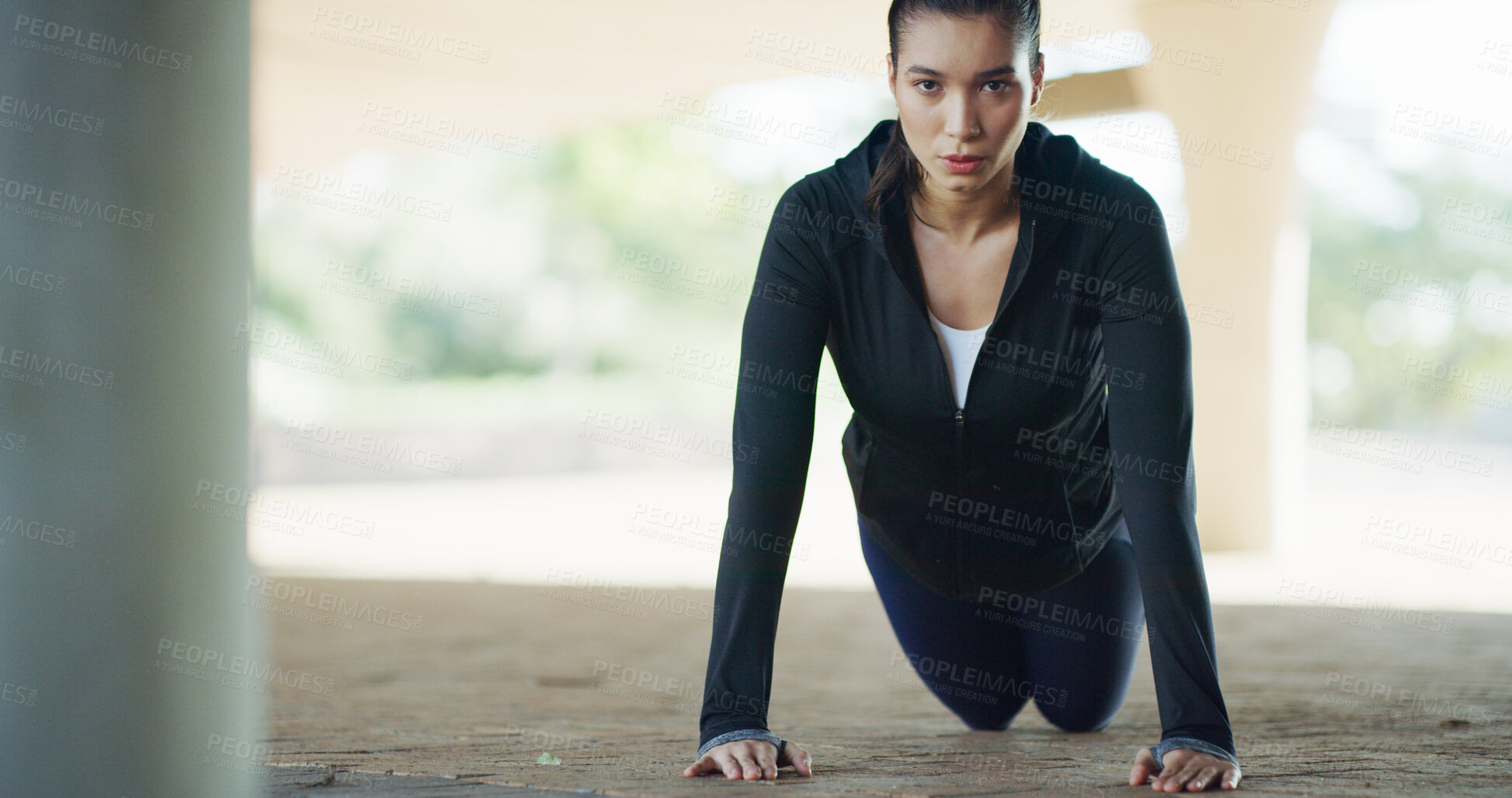 Buy stock photo Woman, portrait and fitness with push ups in city for workout, exercise or muscle gain. Active, serious or female person lifting bodyweight for strength, health and wellness on floor in an urban town