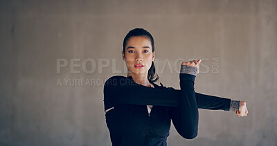 Buy stock photo Fitness, woman or stretching at wall with portrait, warm up or ready for workout. Athlete, start or arm exercise at city space with commitment, development or ambition for healthy body in Puerto Rico