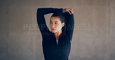 Buy stock photo Fitness, girl and thinking at wall for stretching, warm up and ready for workout. Woman, start and arm exercise at city space with commitment, development and ambition for healthy body in Puerto Rico