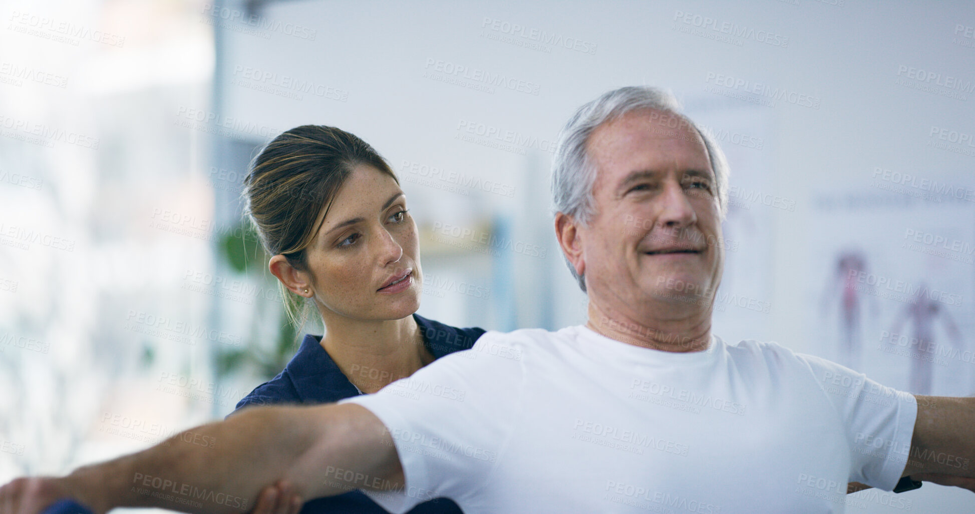 Buy stock photo Woman, elderly man and physiotherapy stretching at clinic, shoulder consultation and rehabilitation. Specialist, senior person and examine physical strain for healthcare, chiropractor and assessment