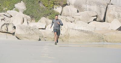 Buy stock photo Beach, man and portrait with running for fitness, exercise and sprinter with pace for wellness outdoor. Ocean, male person and runner with speed for training, cardio and preparation for marathon race