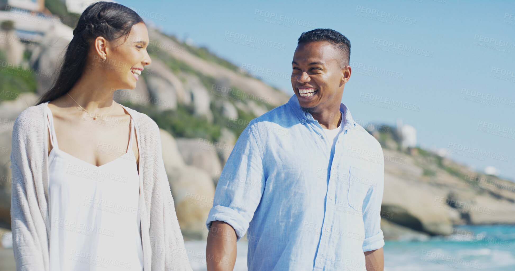 Buy stock photo Beach, couple and laughing while walking for vacation, travel holiday and bonding together by ocean. Happy people, woman and man with commitment in interracial relationship, love and joke in Miami