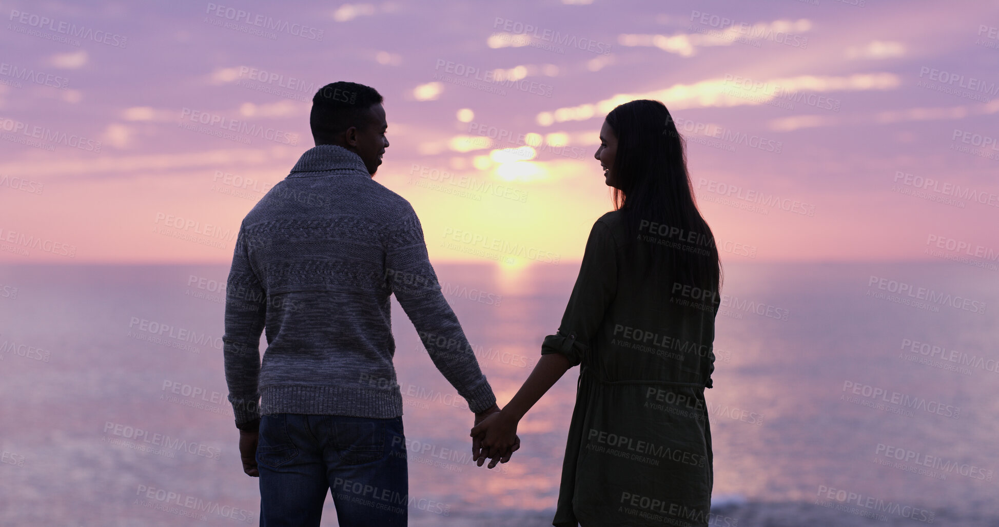 Buy stock photo Sunset, beach and couple holding hands on romantic date, holiday adventure or sightseeing from back. Evening sky, man and woman on travel vacation with love, view or outdoor journey together at ocean