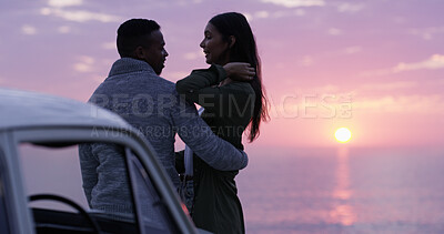 Buy stock photo Sunset, ocean and couple embrace on road trip, romantic date or happy holiday adventure together. Evening sky, man and woman at car on travel vacation with love, nature and outdoor journey at beach